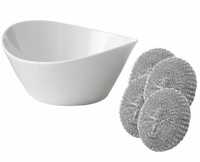 A white porcelain bowl is cleaned clearly by galvanized steel scrubbers.